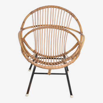 Rattan shell armchair with armrests