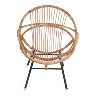 Rattan shell armchair with armrests