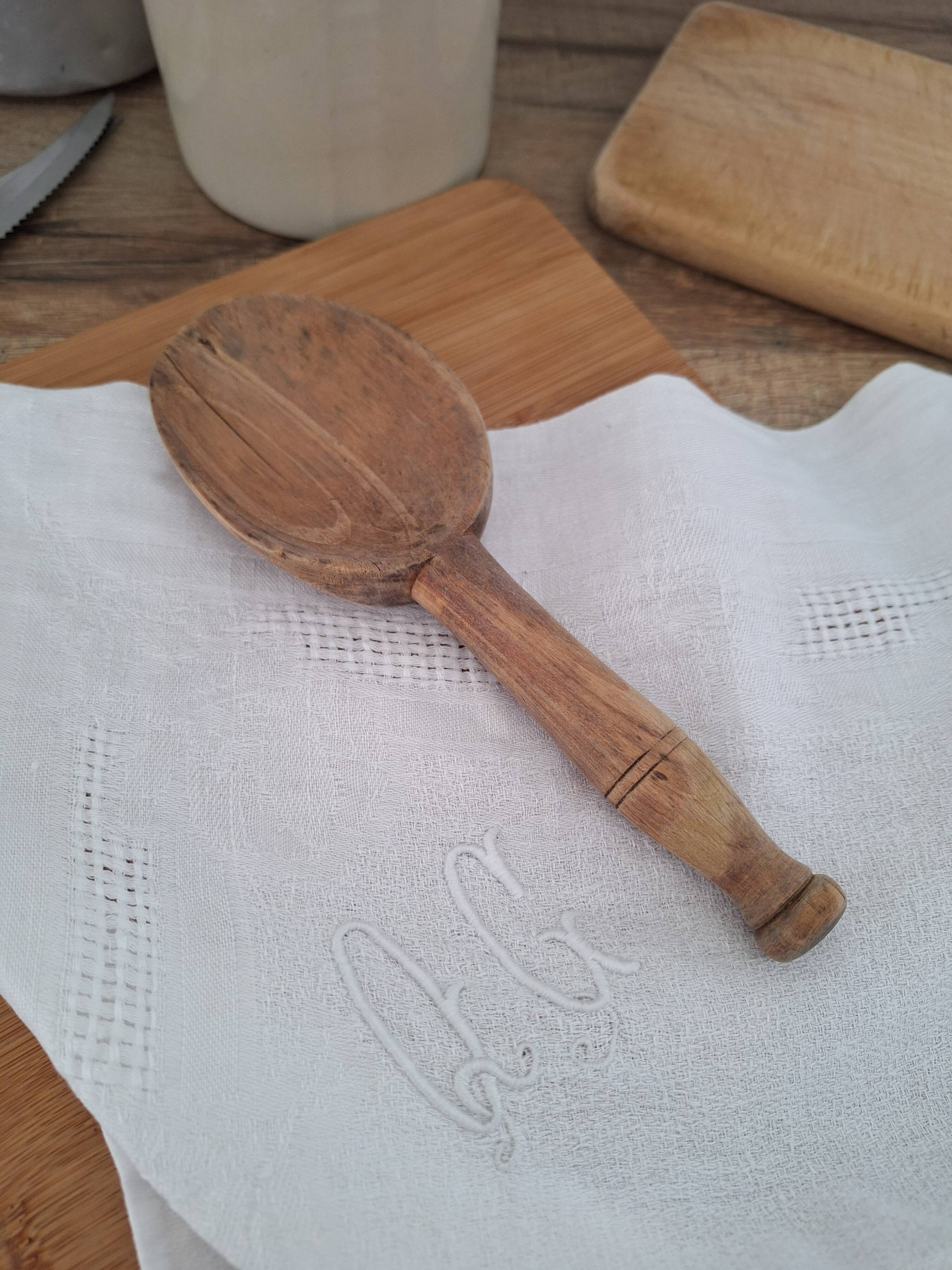 Vintage wooden butter spoon