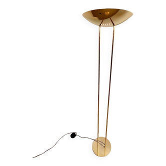 Old golden brass floor lamp with Italian design bulb from the 70s vintage