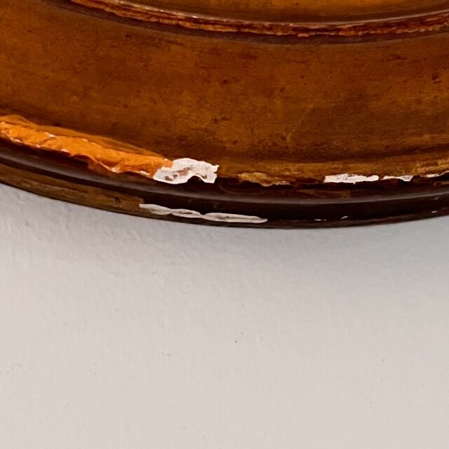 Witch's mirror with wood frame and curved ice