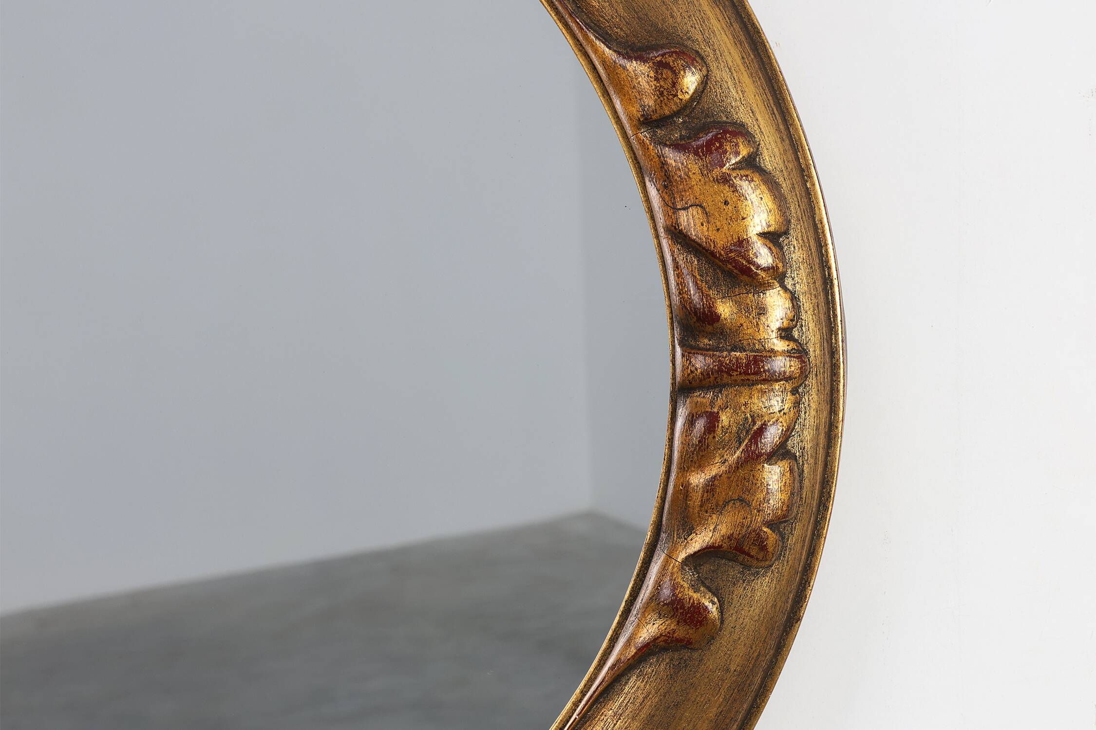 Art Deco oval gilt oak mirror, Belgium 1920s
