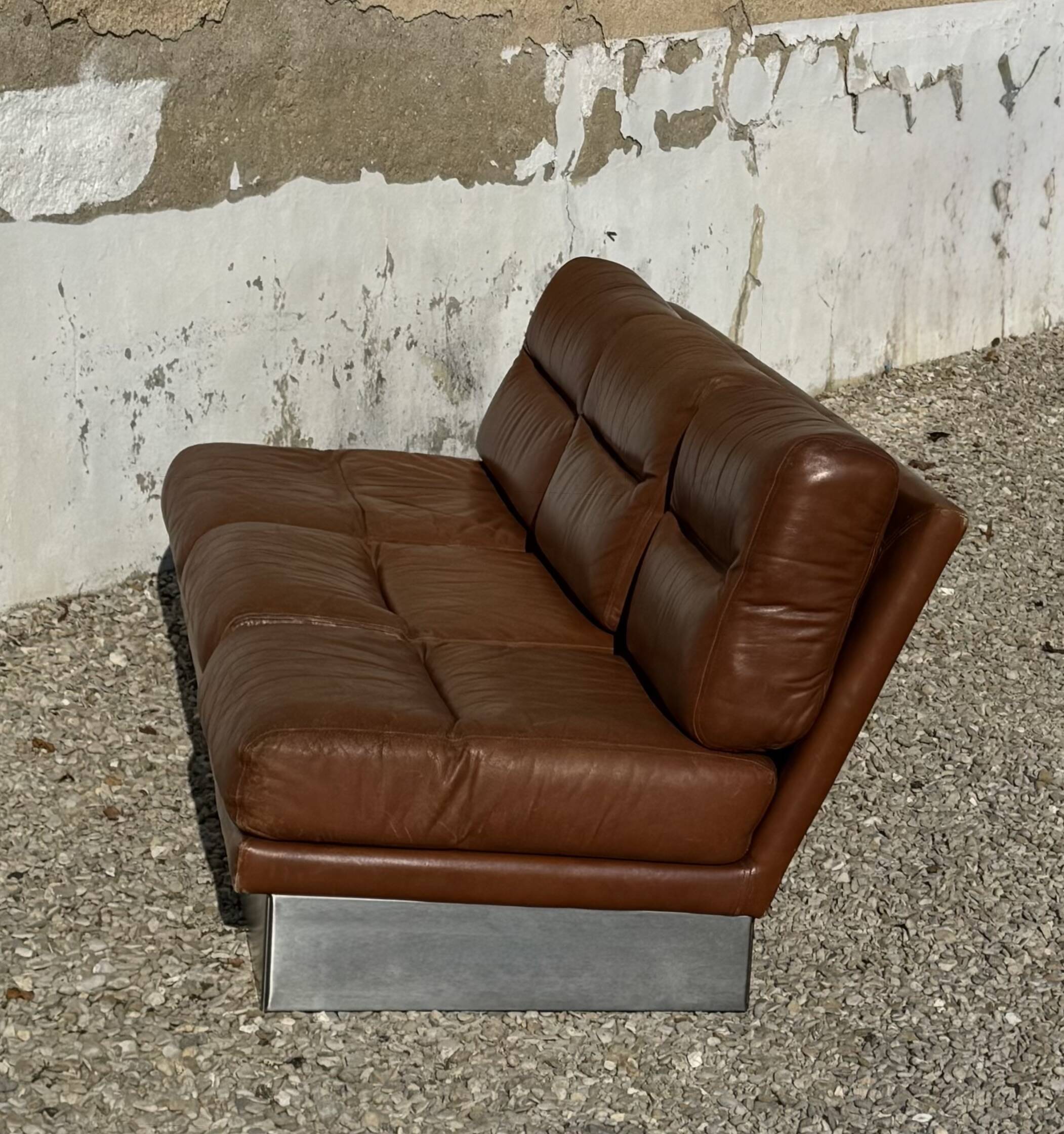Three-seater canapé in brushed aluminium and brown leather, France, 1970.