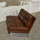 Three-seater canapé in brushed aluminium and brown leather, France, 1970.