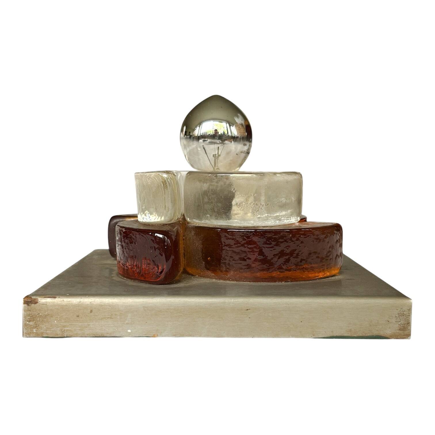 Pair of sculptural wall lights in moulded glass and metal