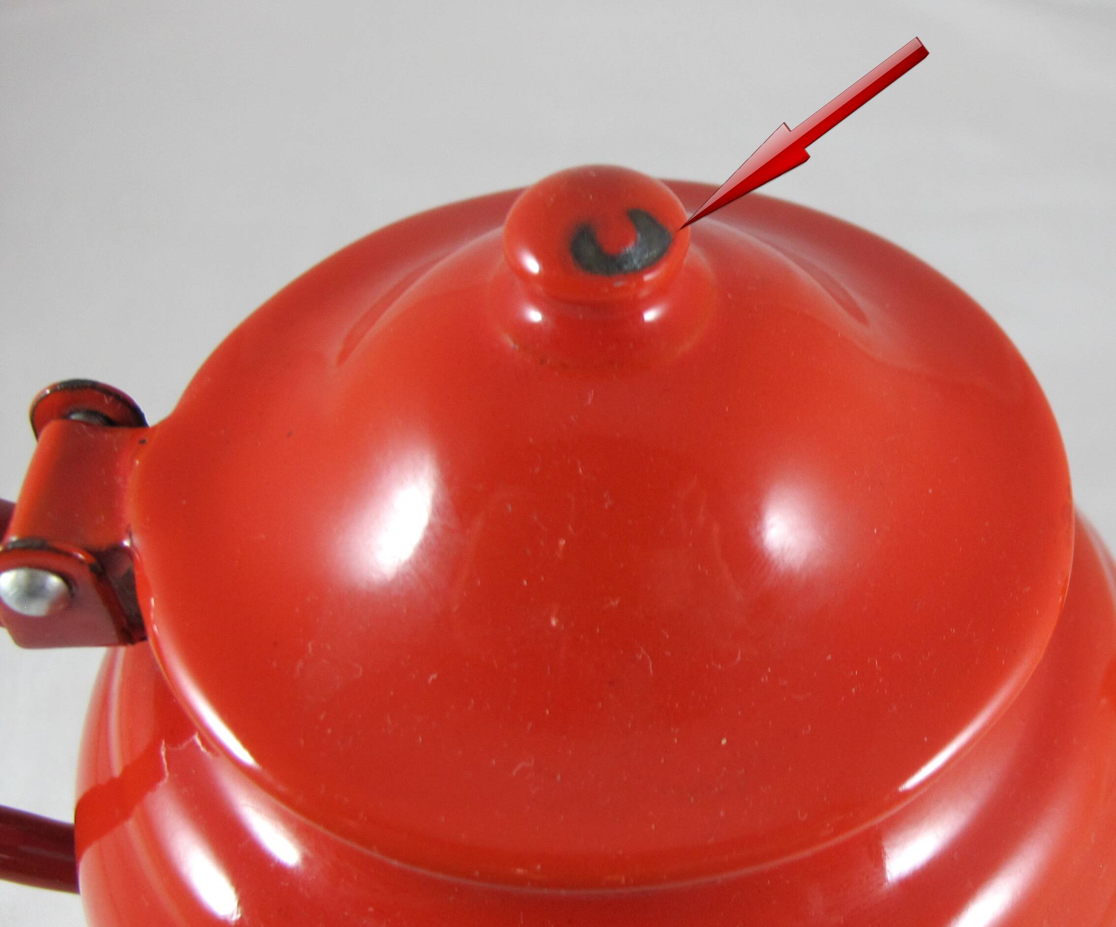 Vintage teapot coffee maker in red enameled metal