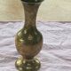 Golden brass vase chiseled vintage floral pattern