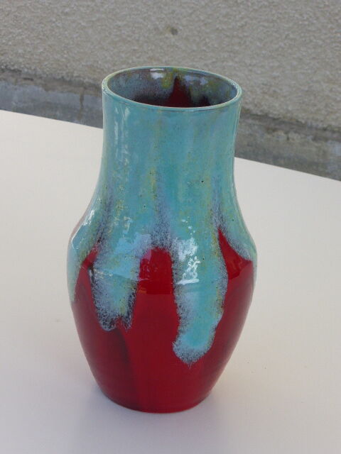 An emailed ceramic vase in turquoise and red, design and vintage
