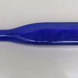 Blue glass bottle, square