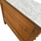 Antique Louis Philippe style chest of drawers with a white marble top.