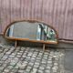 Art Deco concave mirror, arc-shaped, carved in solid wood, 1940.