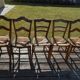 Set of 5 antique wooden chairs with straw seats