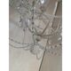 Contemporary ivory florentine iron and crystals chandelier