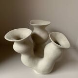 Organic-shaped vase in pyritic stoneware.