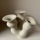 Organic-shaped vase in pyritic stoneware.