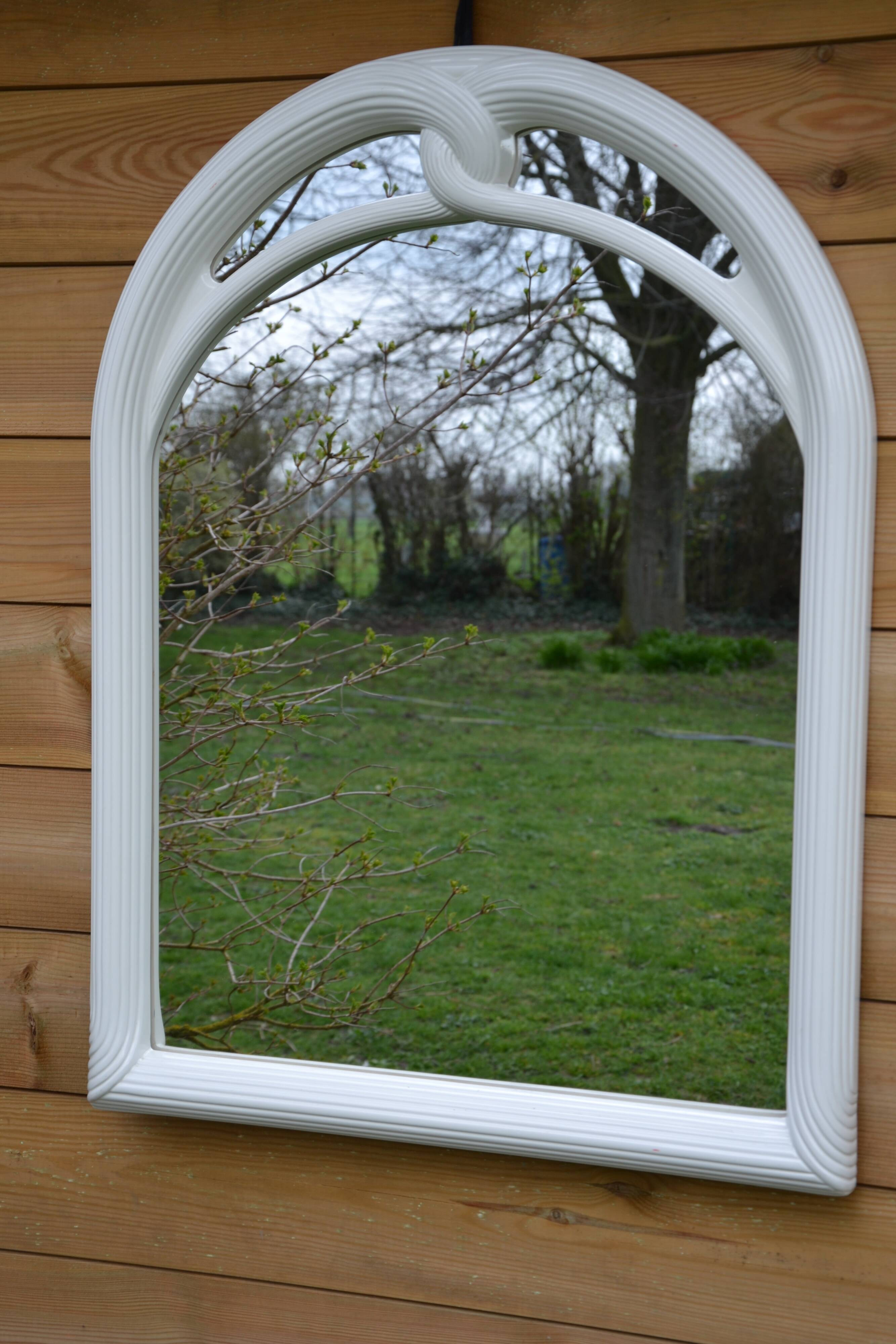 White mirror in 90s Art Deco style