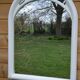 White mirror in 90s Art Deco style