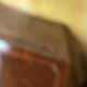 Antique mahogany secretary, upholstered flap and interior storage