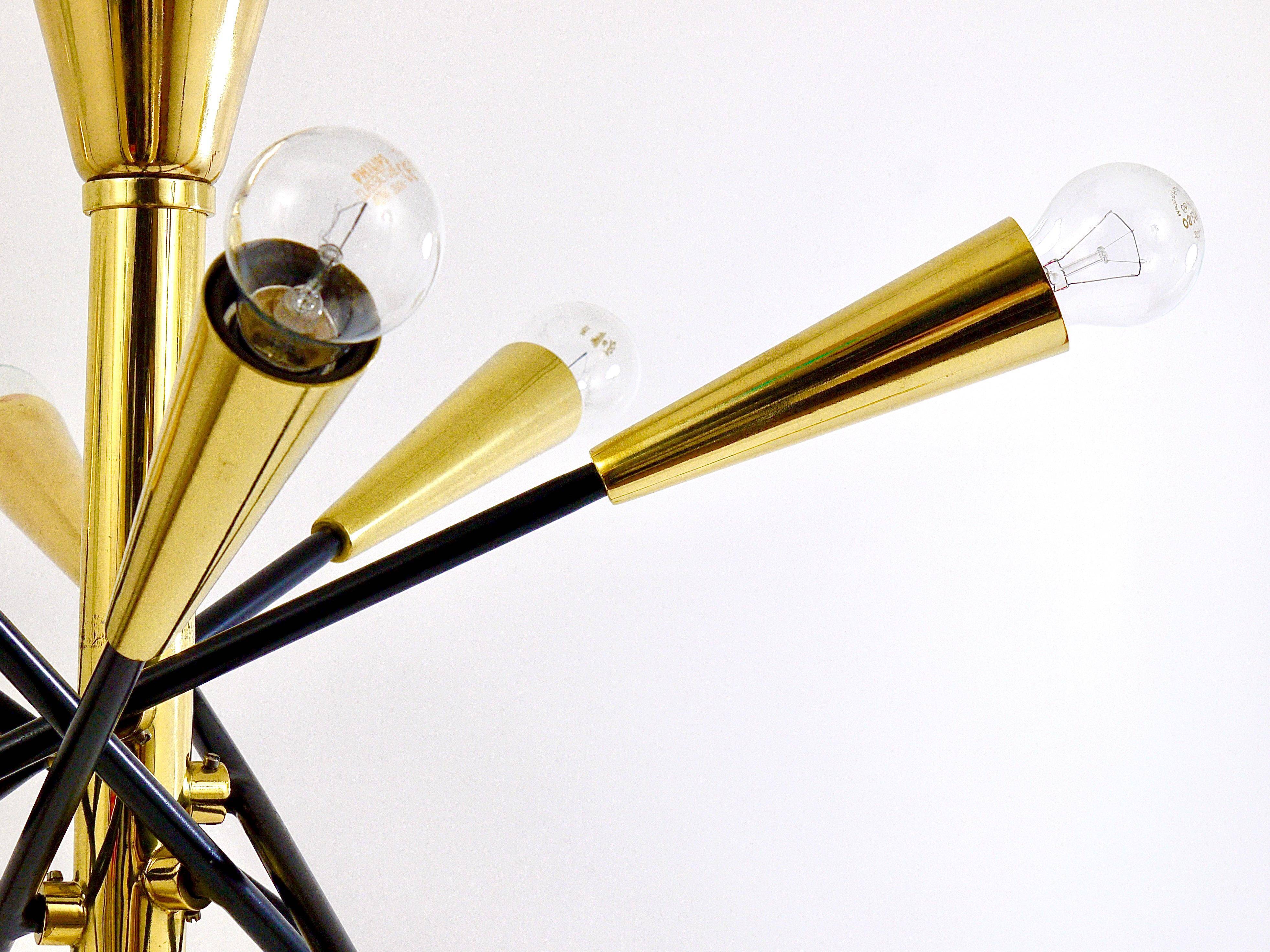 Black and brass articulated Sputnik chandelier in Stilnovo style, Italy, 1950.