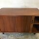 Vintage storage cabinet box on feet with sliding curtain