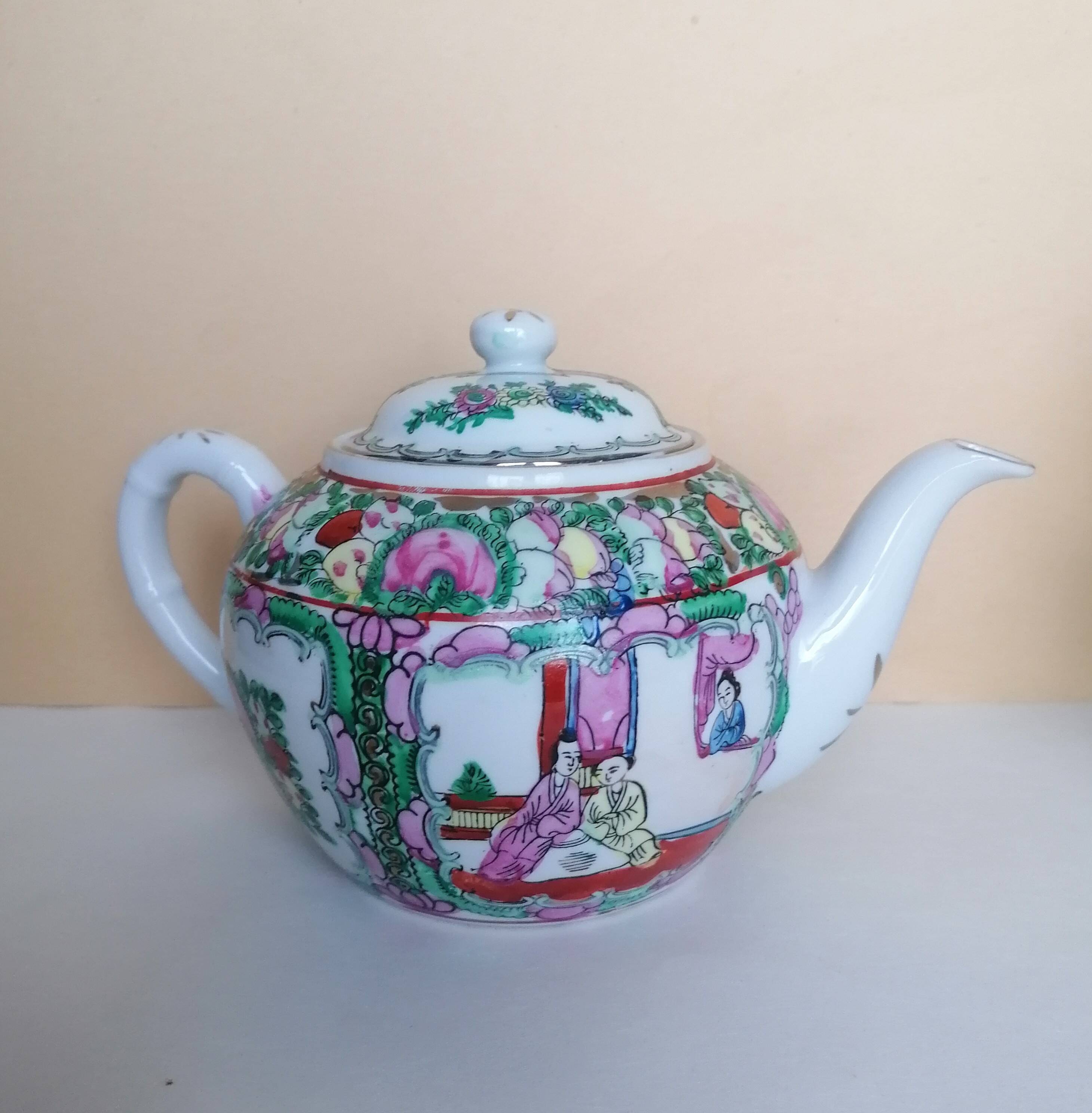 Canton porcelain tea service with 6 cups and teapot.