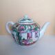 Canton porcelain tea service with 6 cups and teapot.