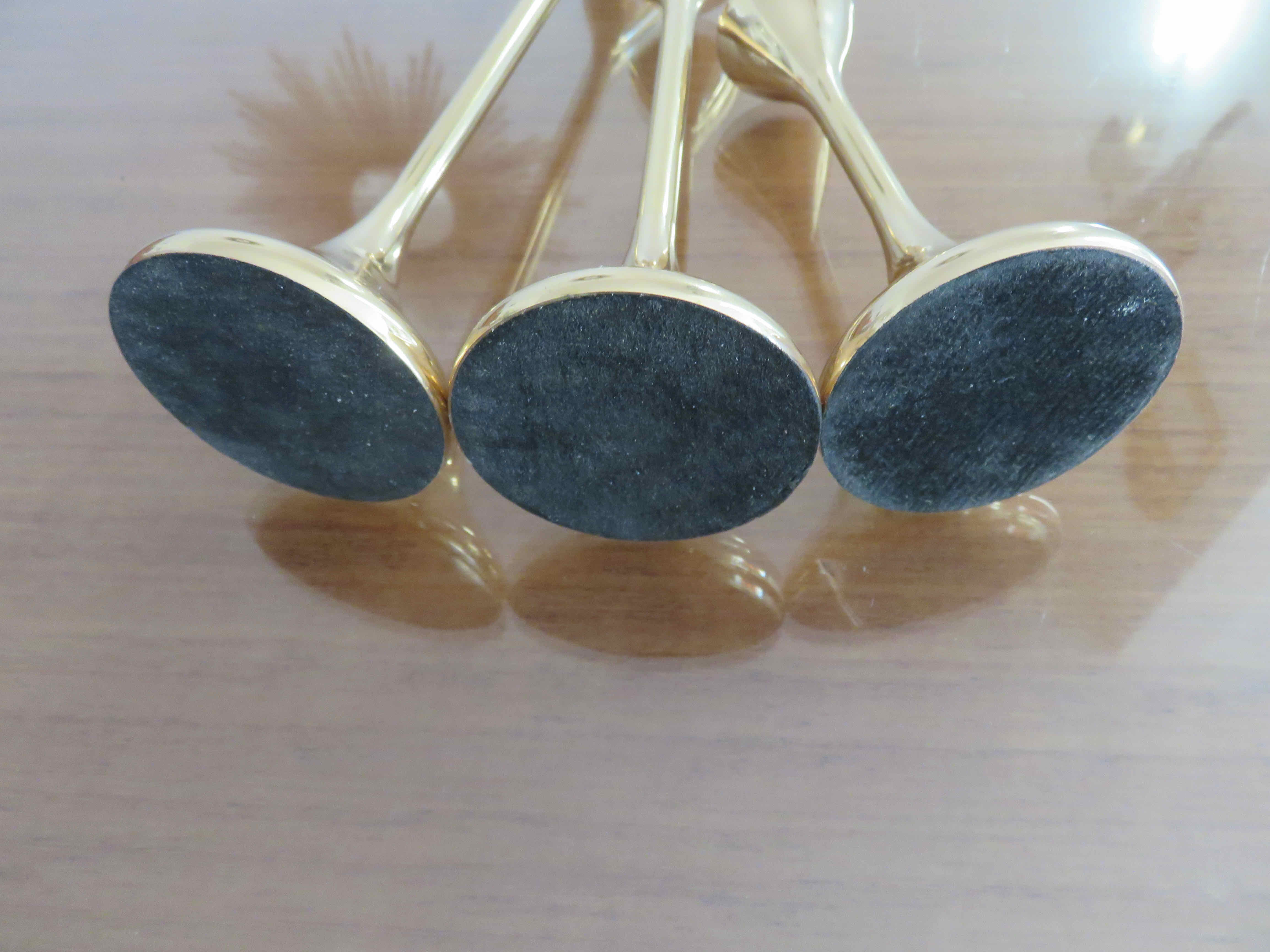 Series of 3 Scandinavian brass candle holders, 70s tulip foot