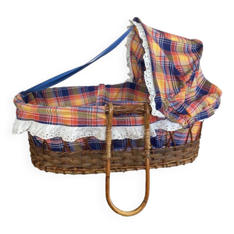 Transportable wicker rattan bassinet cradle from the 1970s complete with bedding
