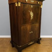 Rare Empire period mahogany secretary with four columns topped with bronze capitals.