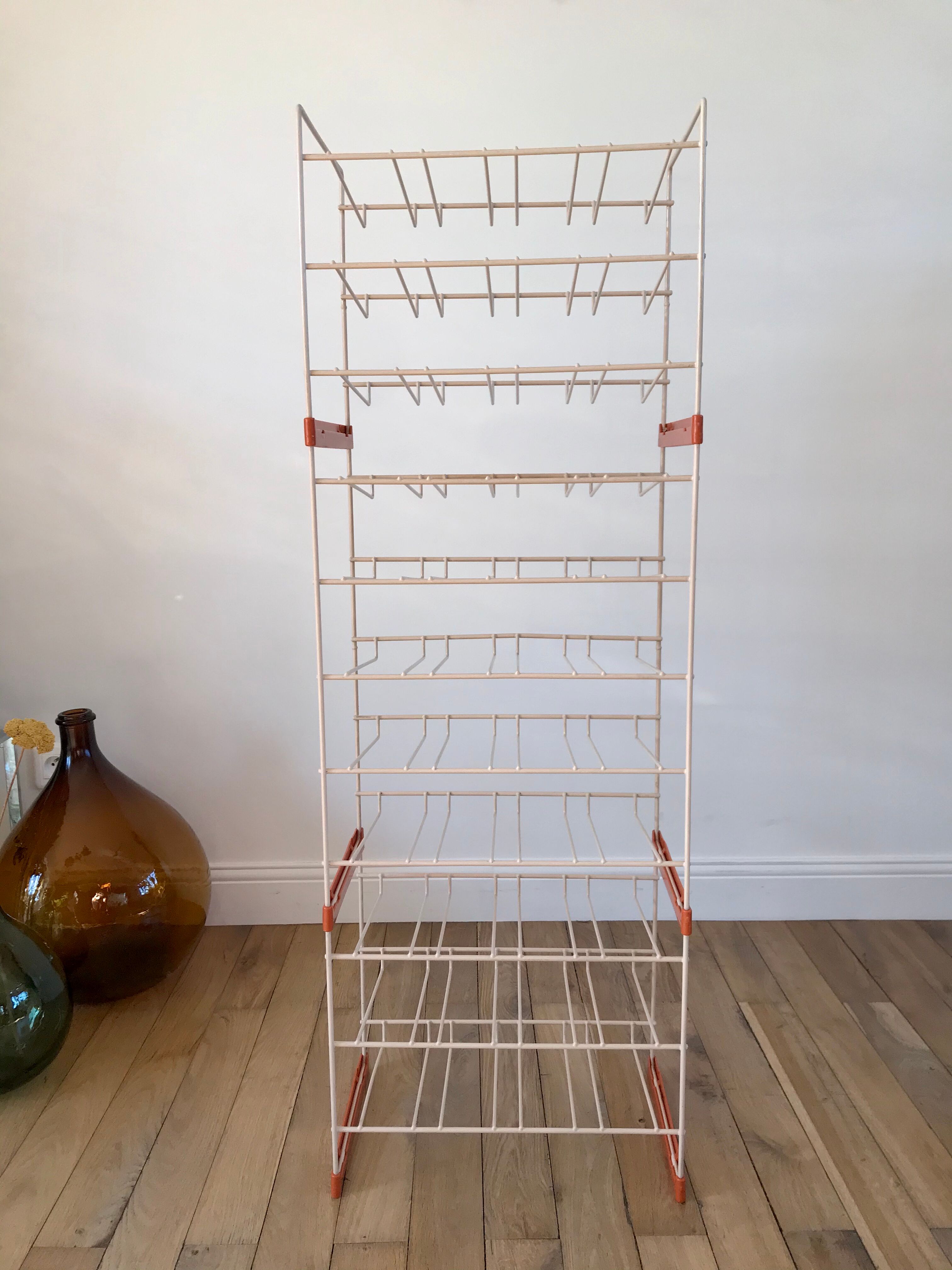 White and orange industrial shelf brand "caddie" 50s