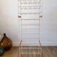 White and orange industrial shelf brand "caddie" 50s