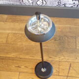 Vintage push-up ashtray on foot