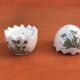 Egg-shaped ceramic salt and pepper shakers with Couslip decor (primrose)