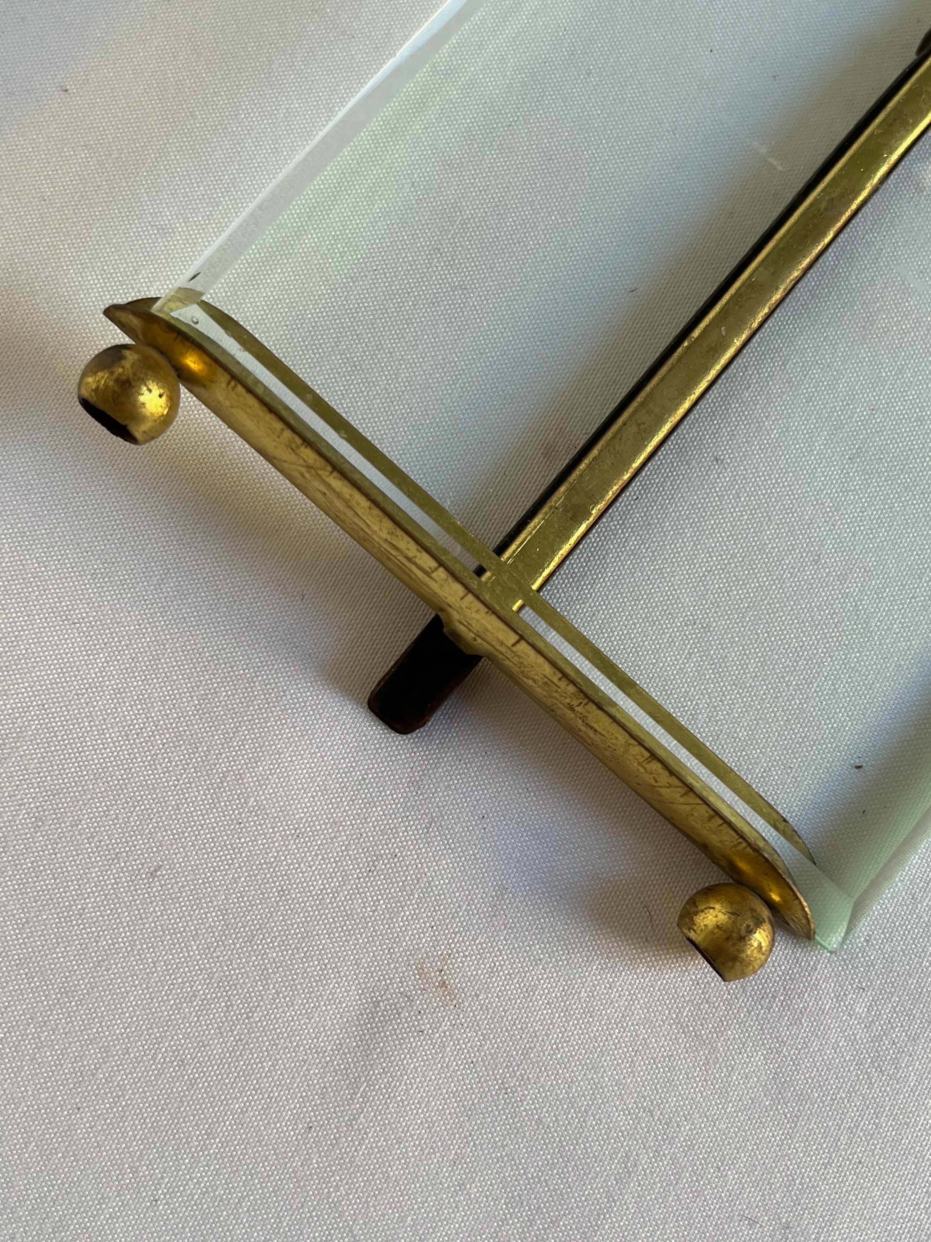 Brass frame and beveled glass