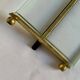 Brass frame and beveled glass