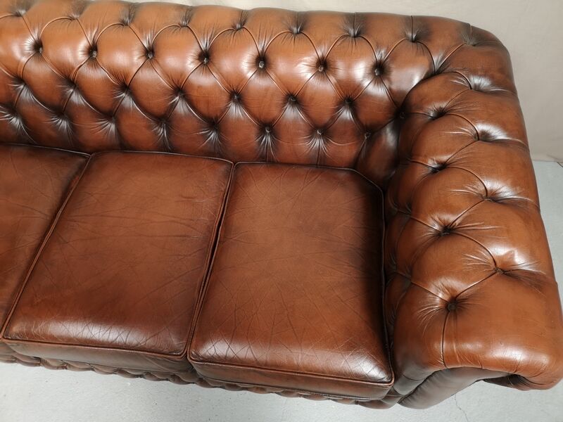 Brown leather chesterfield sofa