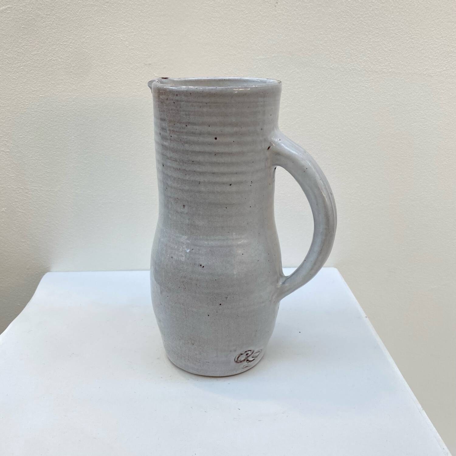 Enameled stoneware pitcher by Jeanne and Norbert Pierlot