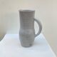 Enameled stoneware pitcher by Jeanne and Norbert Pierlot