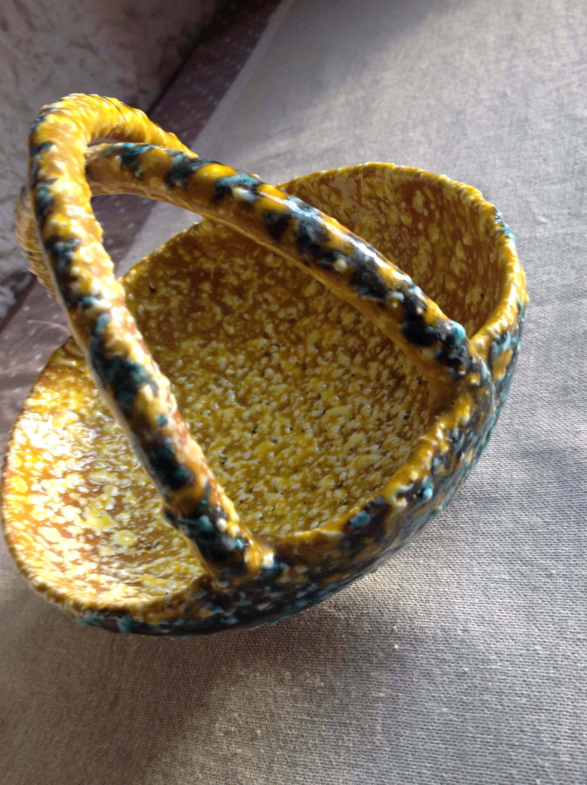 Cup in Fat Lava-style polychrome ceramics