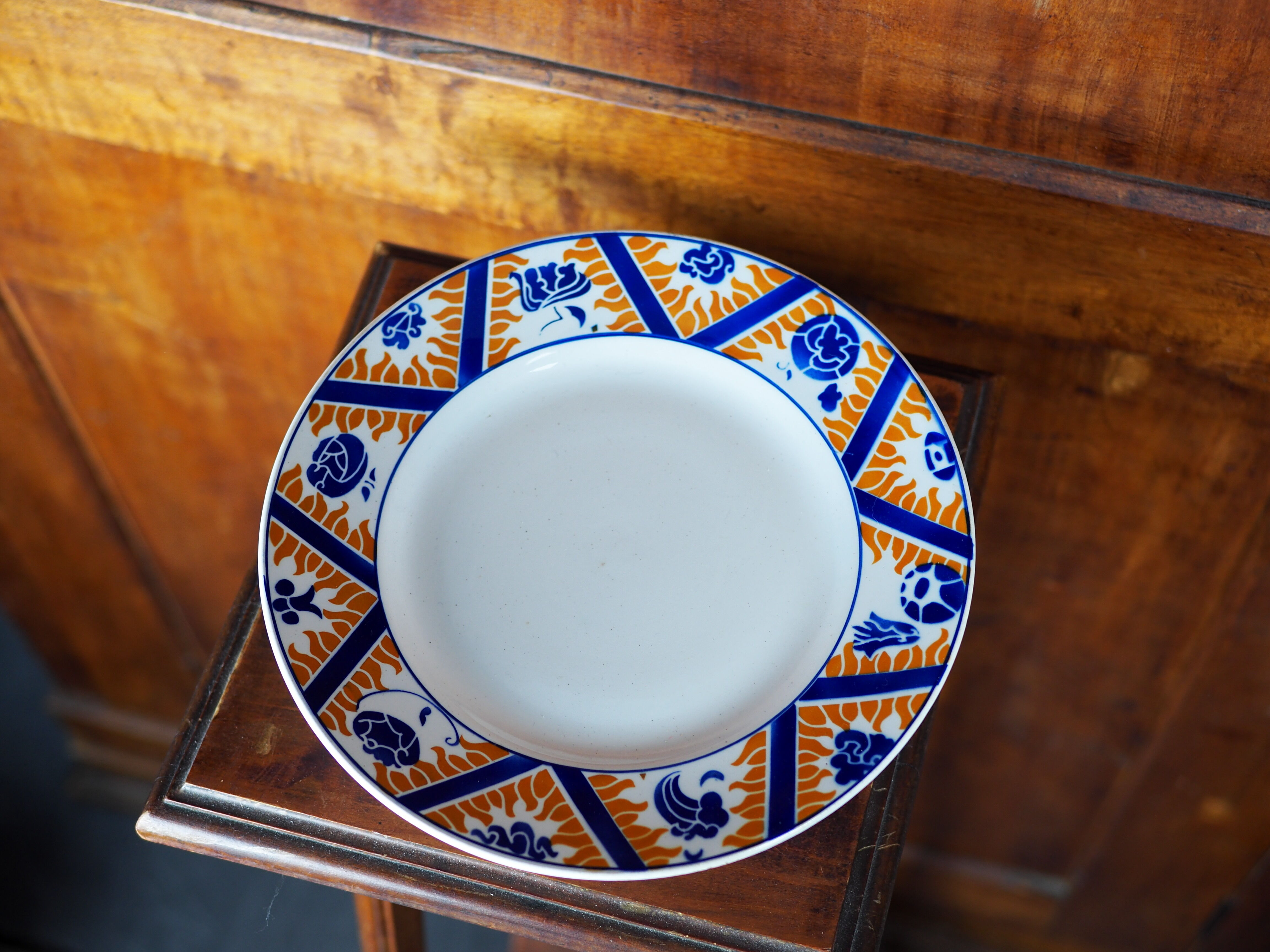Earthenware cake dish patterned with flowers, clouds and flames, orange and blue - Orchies - 50s