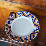 Plat à gâteau en faïence à motif de fleurs, nuages et flammes, orange et bleu - Orchies - 50s
