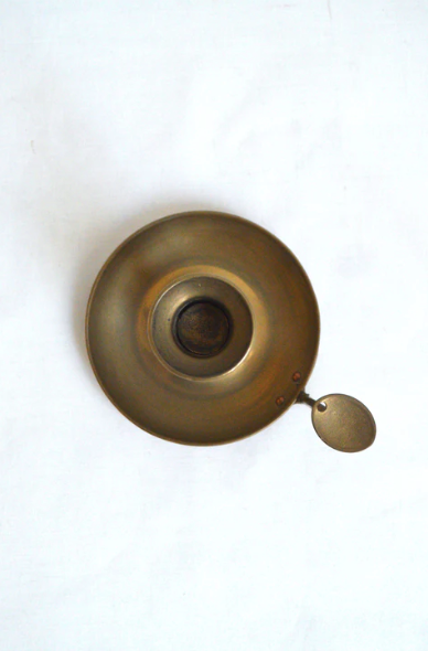 Brass cellar candle holder