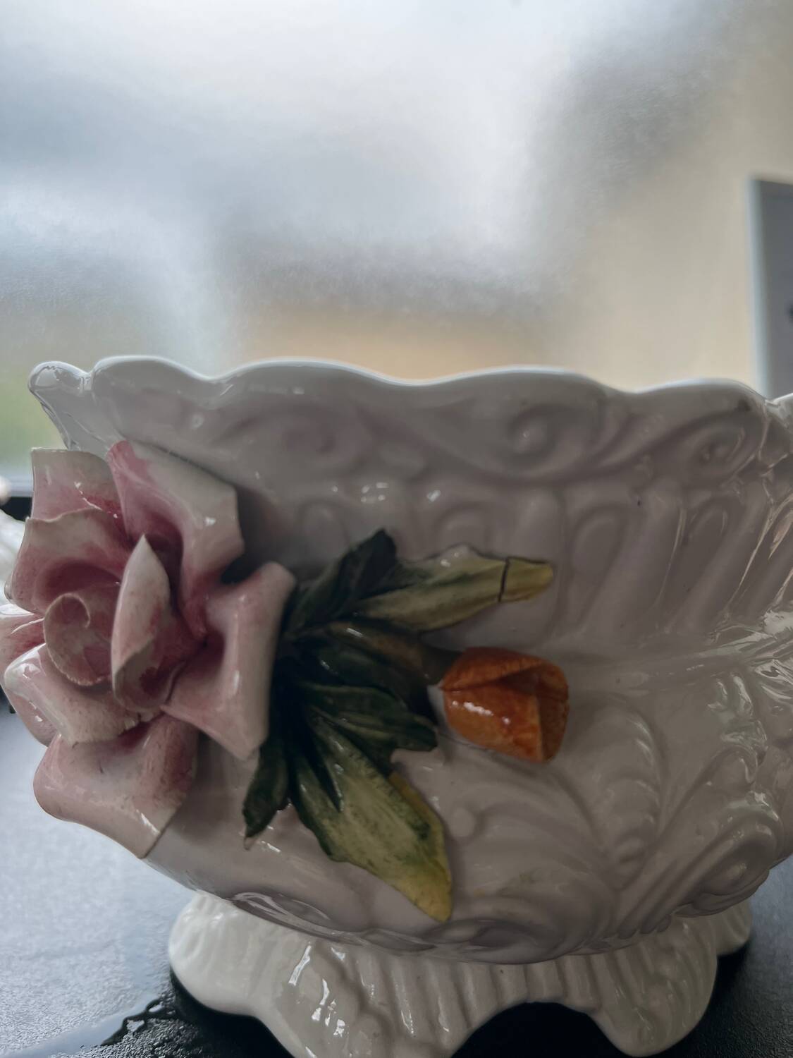 Capodimonte-style porcelain lidded sugar bowl with floral relief