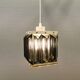 Old Swedish lamp made of metal and smoked solid glass pieces.