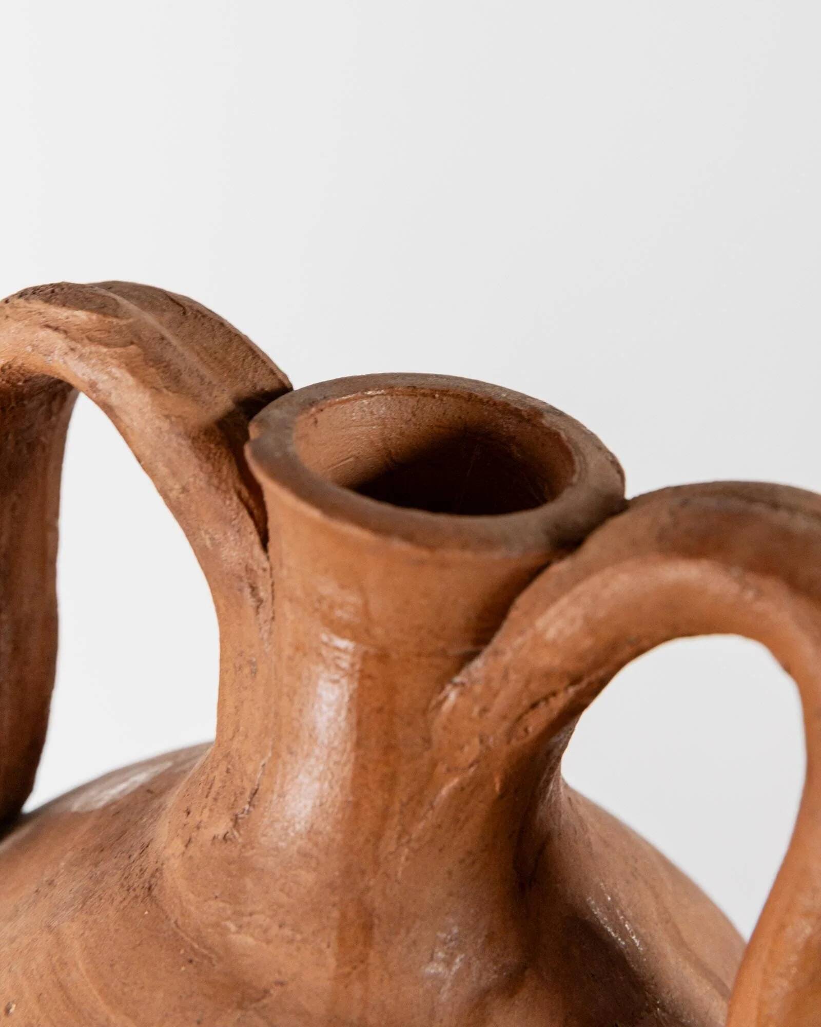 Vintage terracotta amphora vase from the early 19th century, handmade Italian jug with two handles.