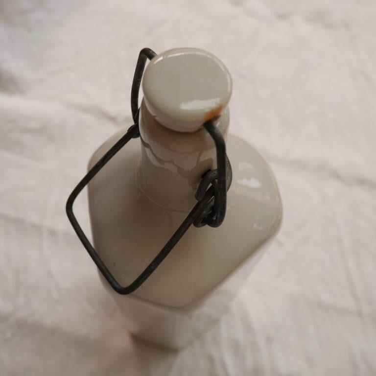 Old stoneware hot water bottle or bottle