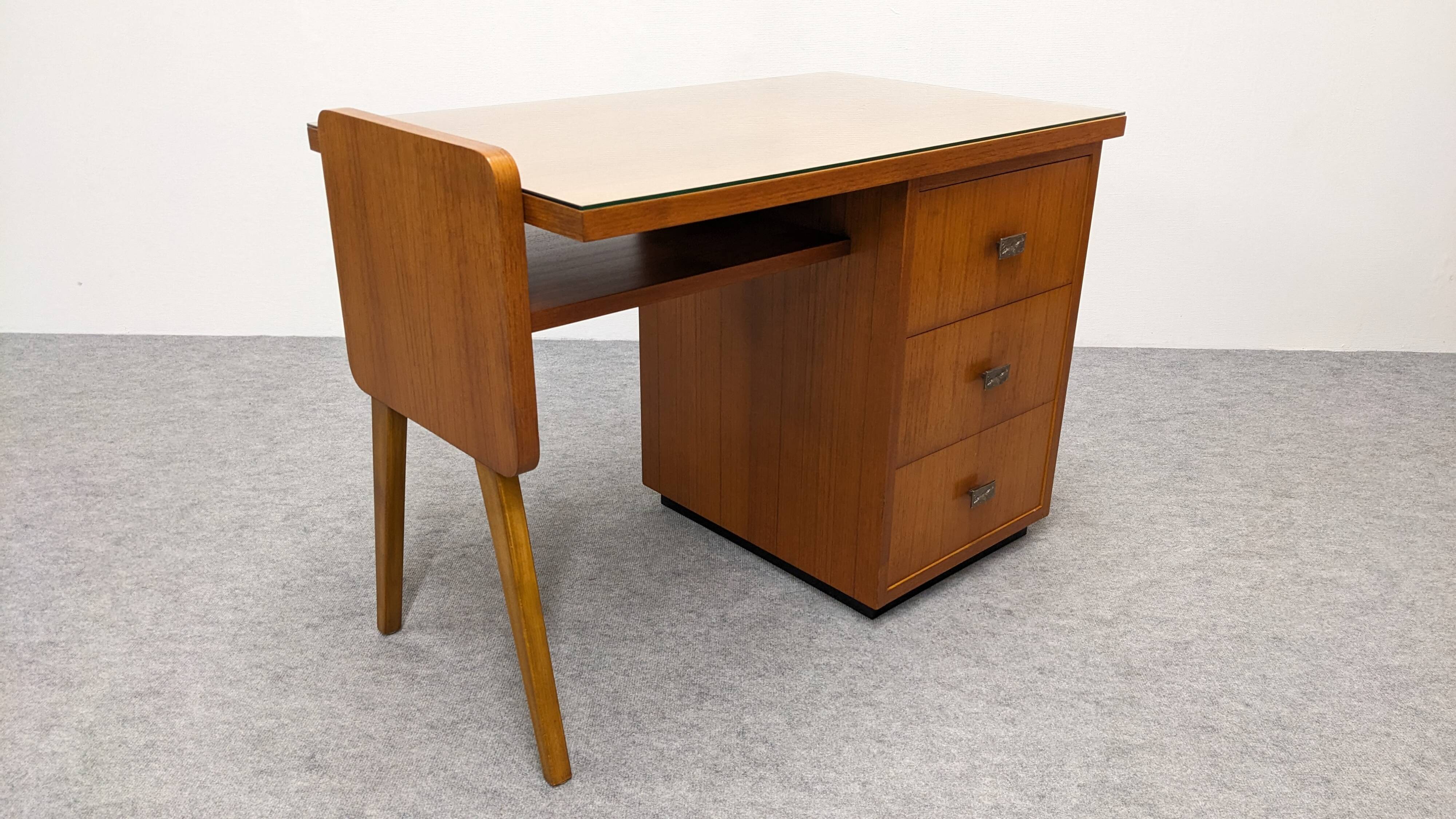 Modernist desk in blonde rosewood, France circa 1960.