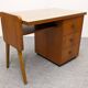 Modernist desk in blonde rosewood, France circa 1960.