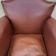 Club armchair in brown skai back mustache