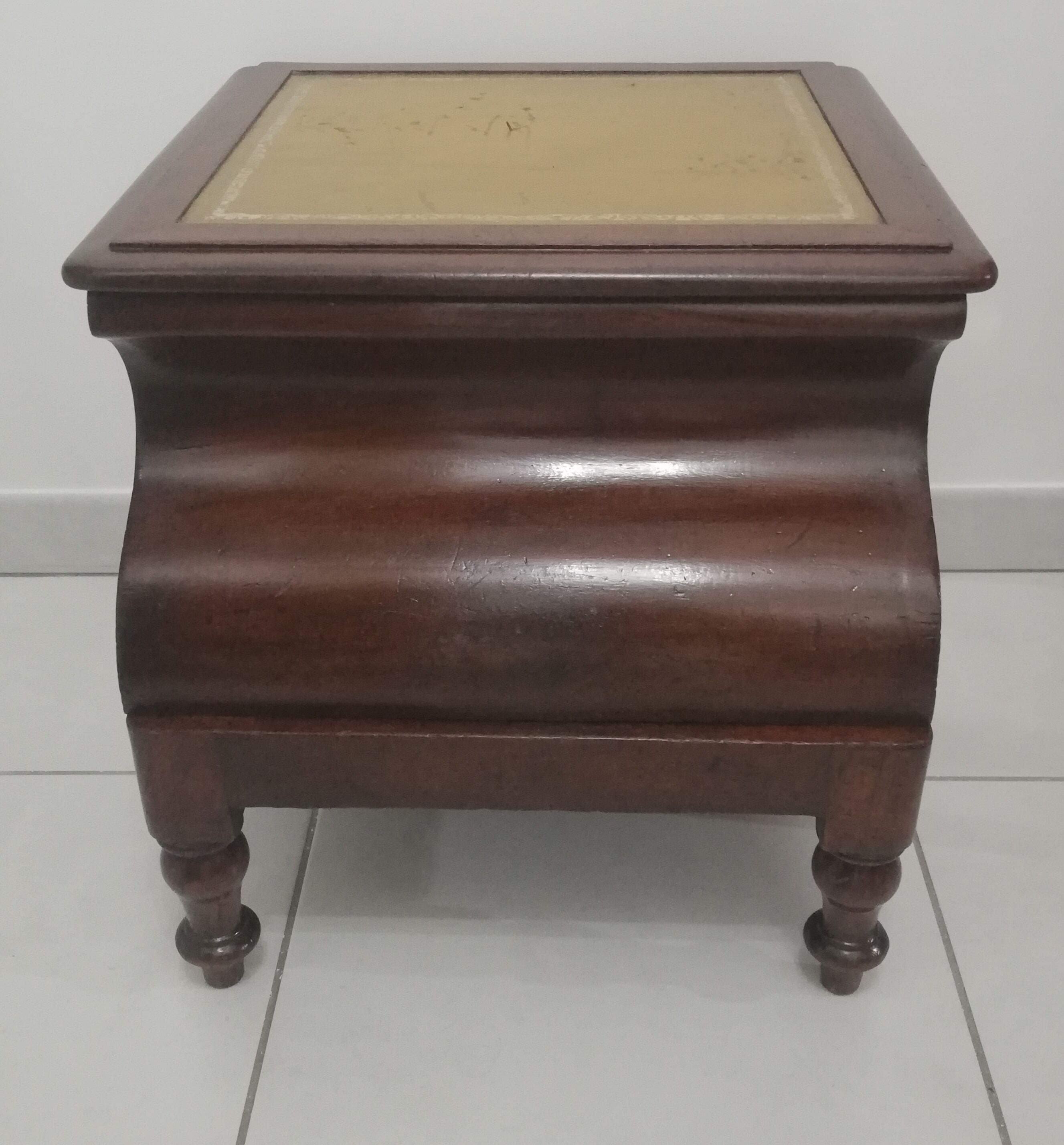 Old stepladder or English mahogany library foot walk